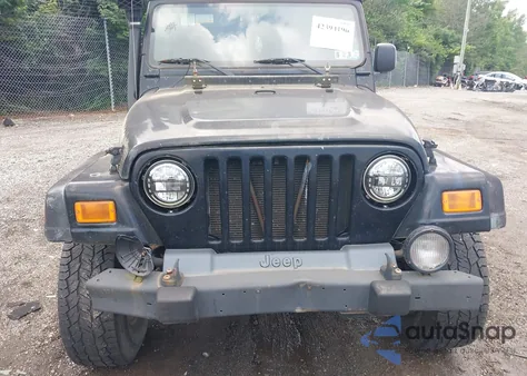 2004 Jeep Wrangler Sport z USA, uszkodzony, nr VIN 1J4FA49S94P792689